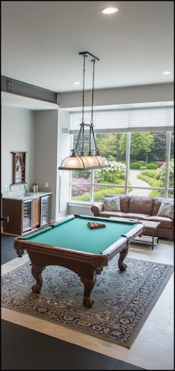 Elegant billiards room with chandelier lighting at Nature's Home
